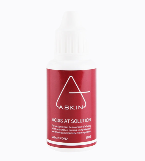 Red bottle of Askin ACDIS AT Solution on a white background
