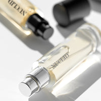 Close-up of a perfume bottle with a blurred background